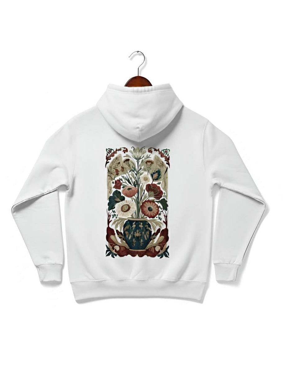 Elegant white hoodie featuring a captivating back graphic inspired by intricate botanical art, showcasing a decorative vase brimming with an array of beautifully rendered flowers and foliage. The artwork presents a rich, muted color palette with deep reds, soft pinks, gentle greens, and subtle earthy tones, giving it a vintage or classic aesthetic that evokes timeless beauty.
The vase itself is ornate, holding a vibrant bouquet of blooming flowers, surrounded by detailed, swirling botanical patterns.