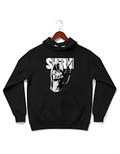 Black oversized Cotton Fleece hoodie and high-top sneakers. The hoodie features a large, bold graphic of a historical figure, Maharani Jindan Kaur, with the word "SHERNI" in large white block typography in the background. The design is loud, graphic, and culturally inspired.