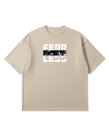 Beige oversized French Terry T-shirt with 'FEARLESS' text and graphic eyes of Sant Jarnail Singh