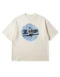Off-White Oversized French Terry T-shirt features a circular blue watercolor-style graphic of a Baaz (Sikh falcon) perched on a branch, flanked by the edgy script "STEEL MAY PIERCE" and "SPIRIT WON'T.